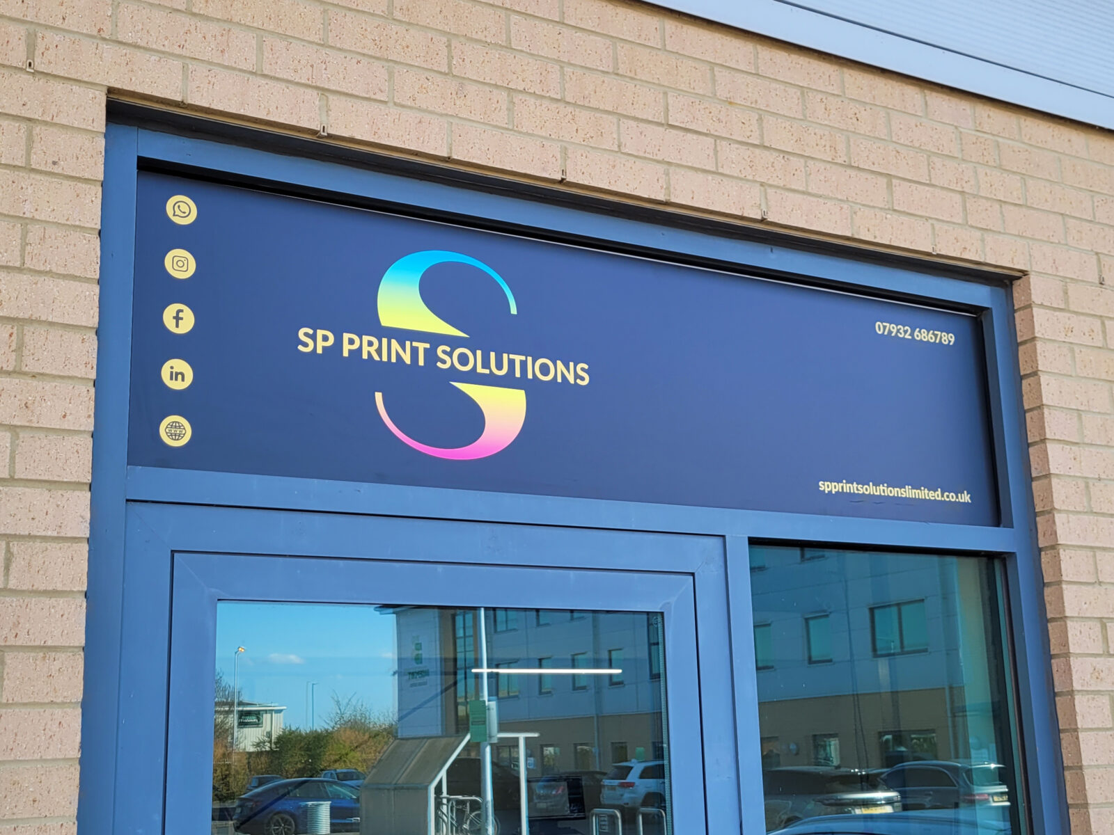 Professional Business Signage - a 3mm ACM panel above a workshop entrance