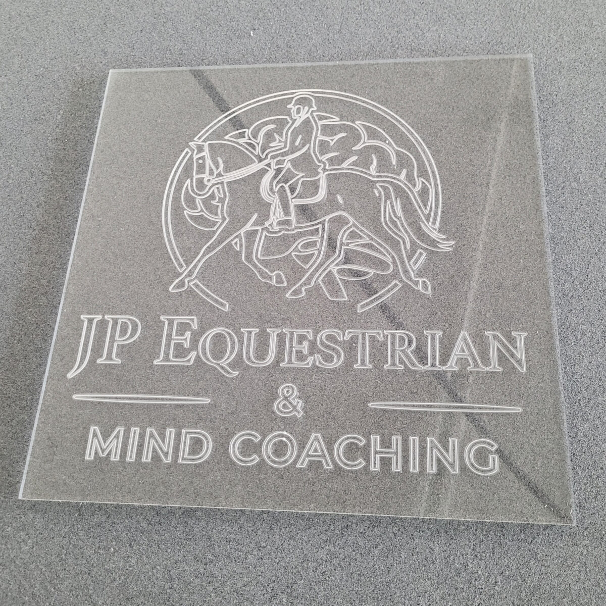 5mm Acrylic panel, engraved with a company logo design
