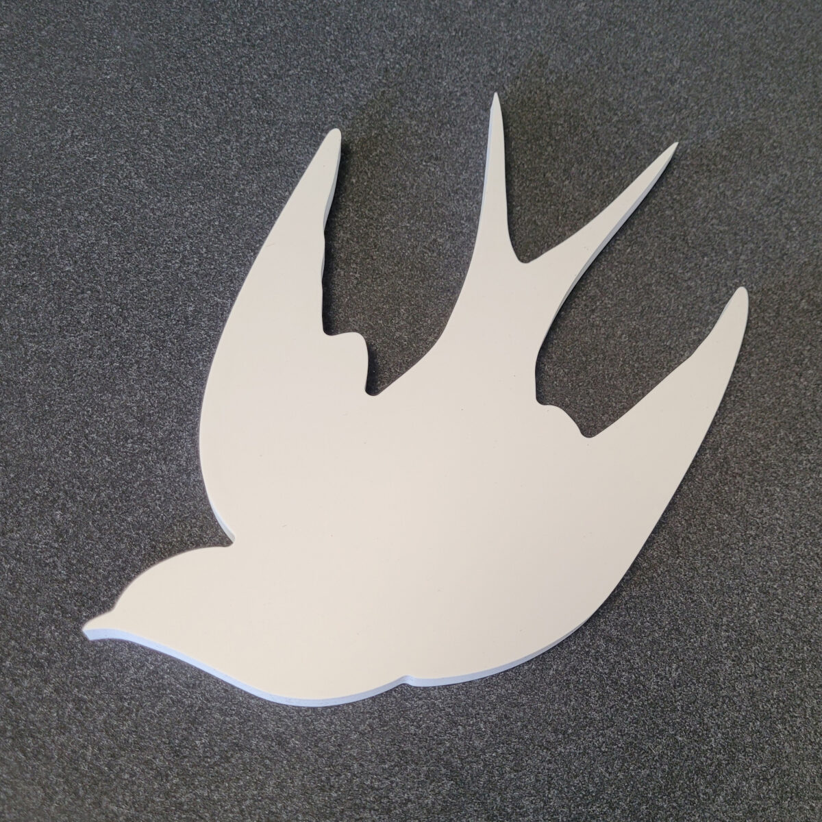 10mm foamex bird silhouette, routed using a 6mm drill bit, to be used as a garden ornament