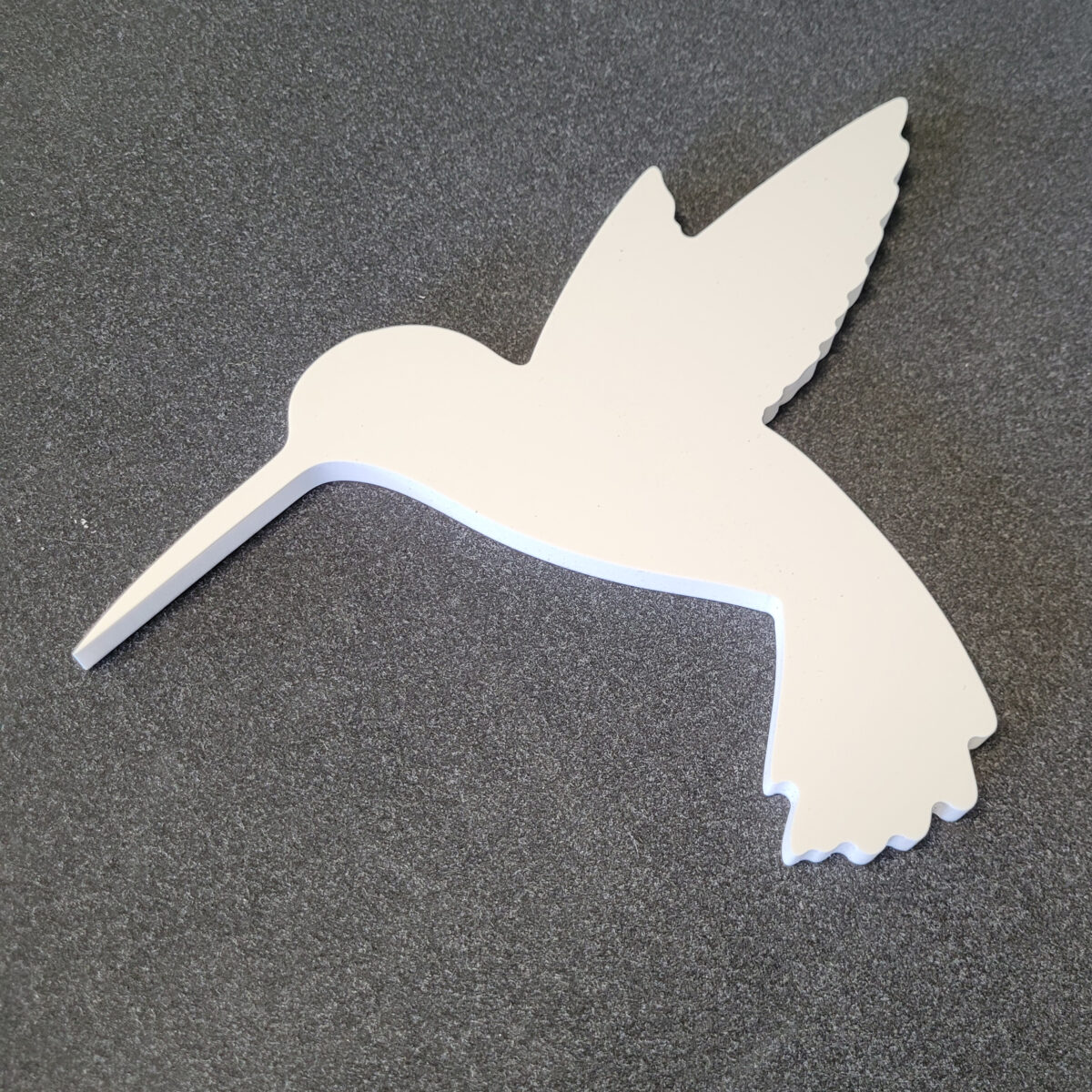 10mm foamex hummingbird silhouette, routed using a 6mm drill bit, to be used as a garden ornament