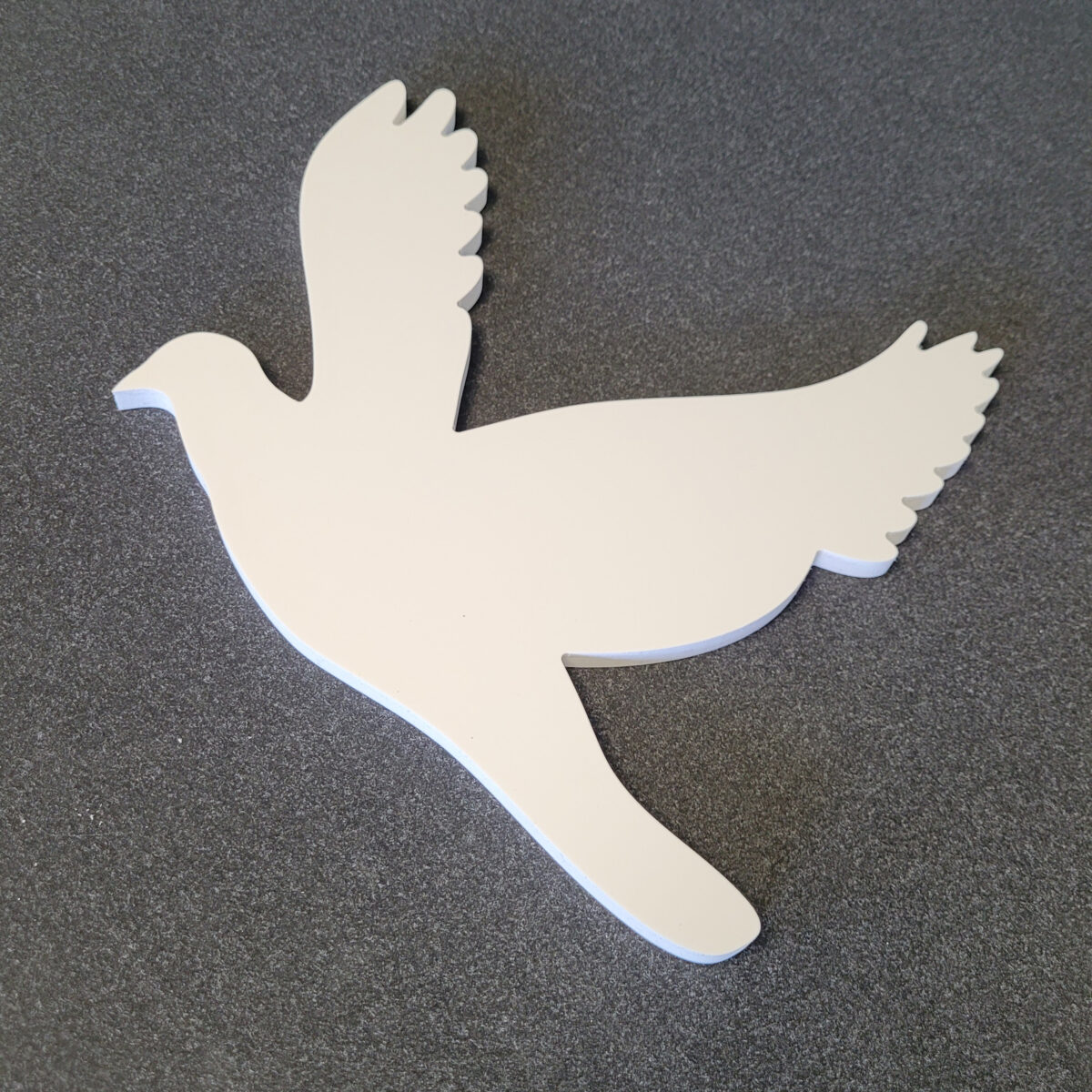 10mm foamex dove silhouette, routed using a 6mm drill bit, to be used as a garden ornament