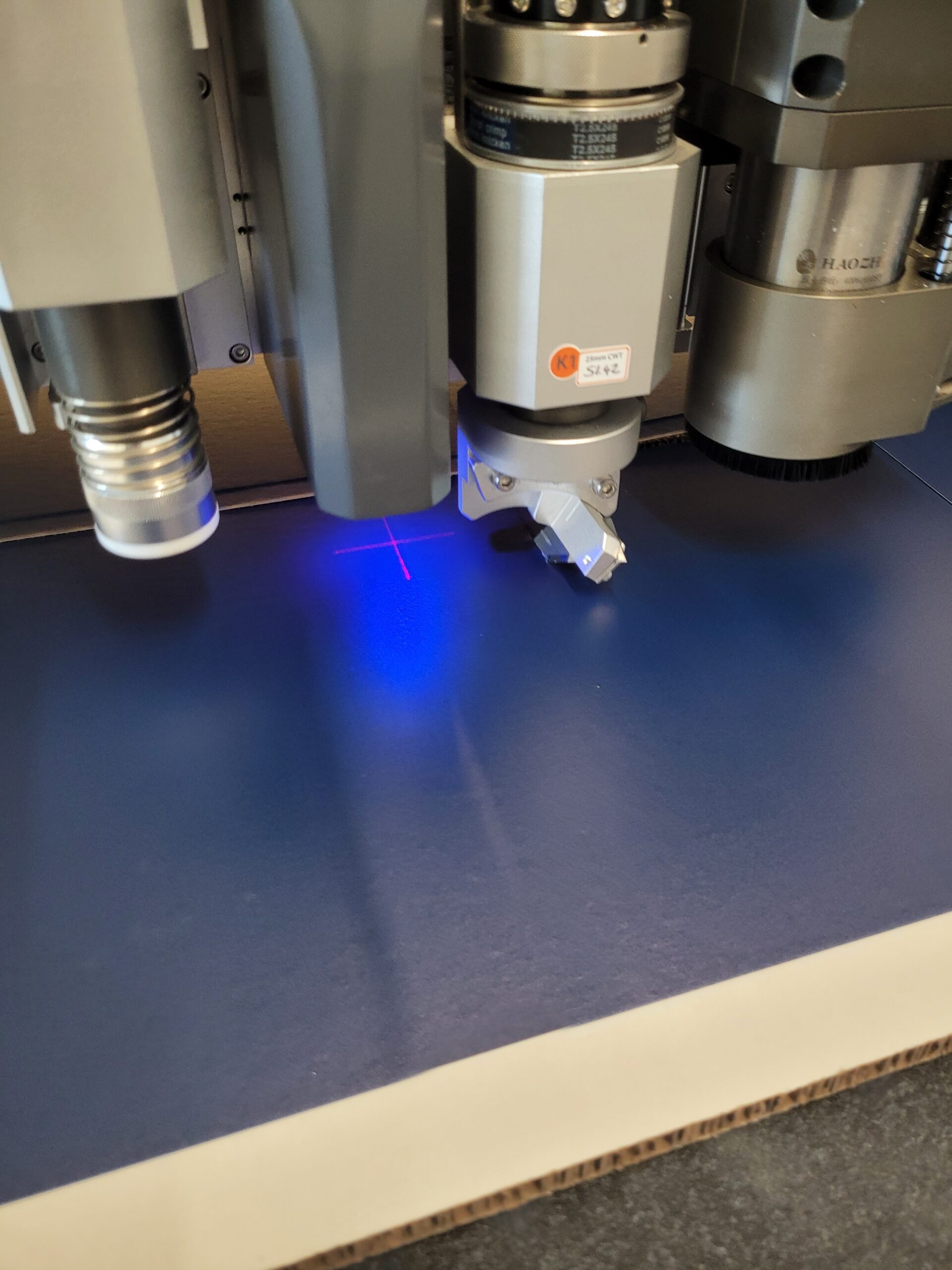 The V shape cutting tool cutting a 10mm Xanita panel
