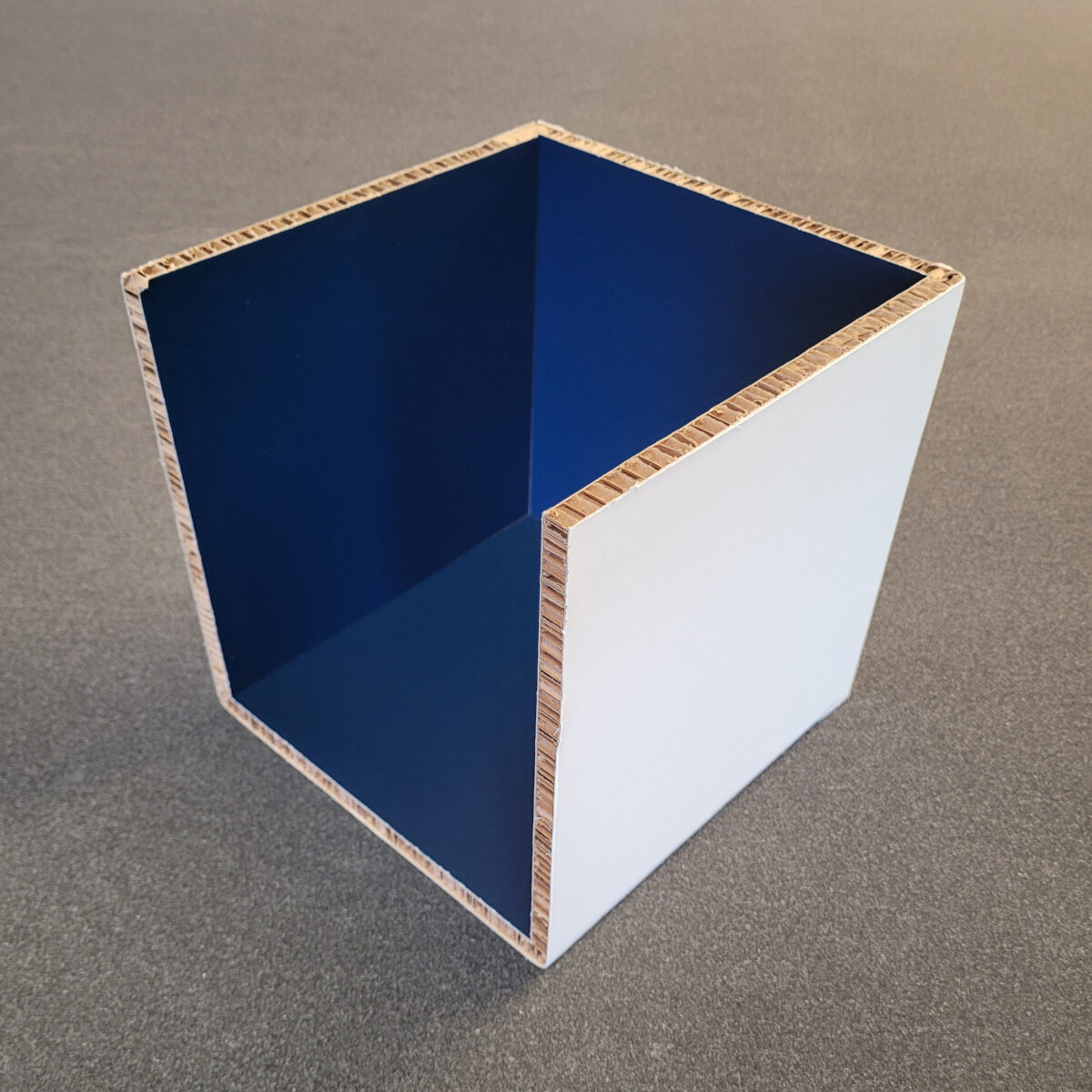 Four sides of a cube, made from 10mm Xanita board, made with EOT and V-cut tools