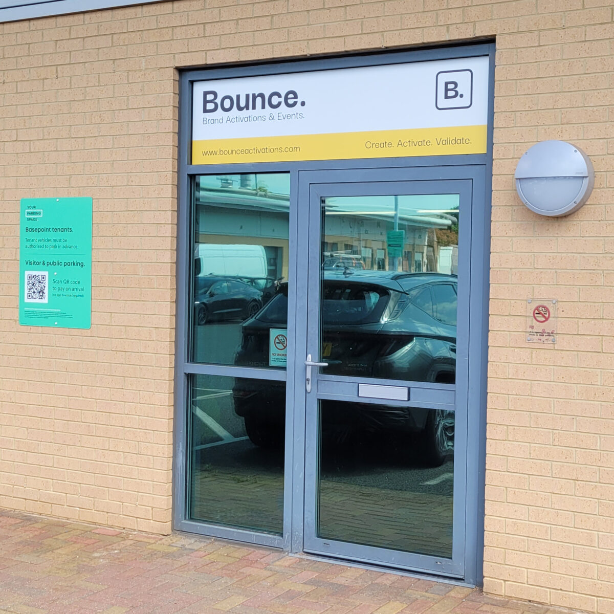 ACM signage above a business entrance